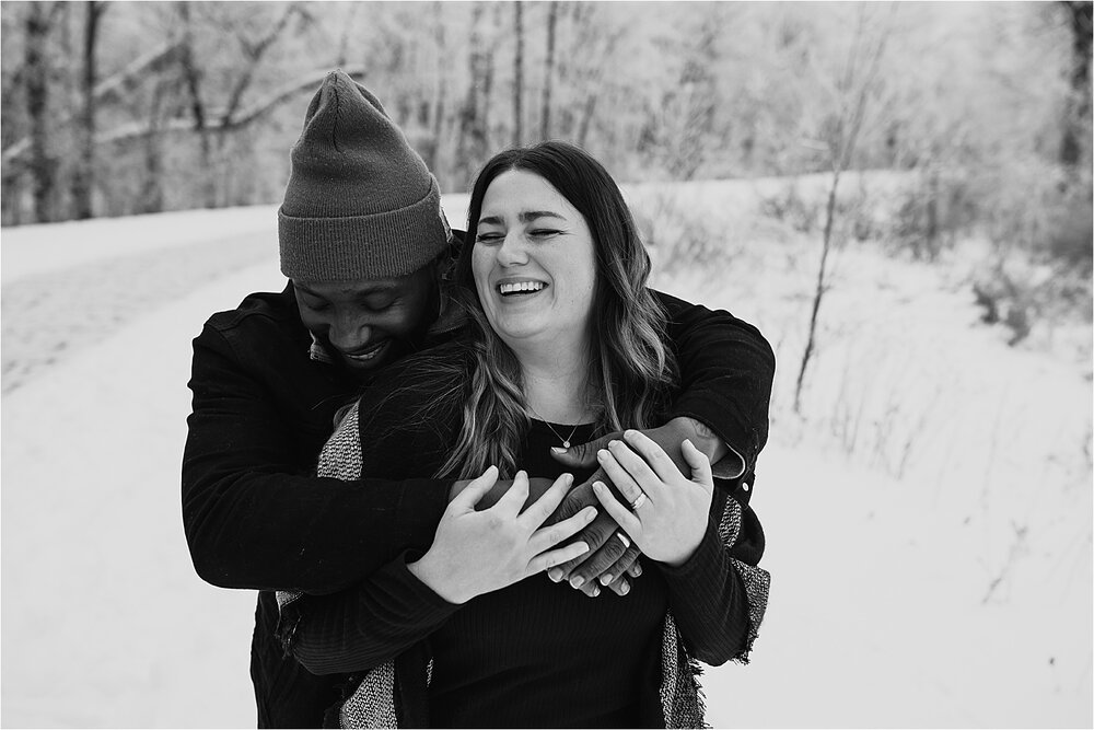 couple-hugging-snow.jpg