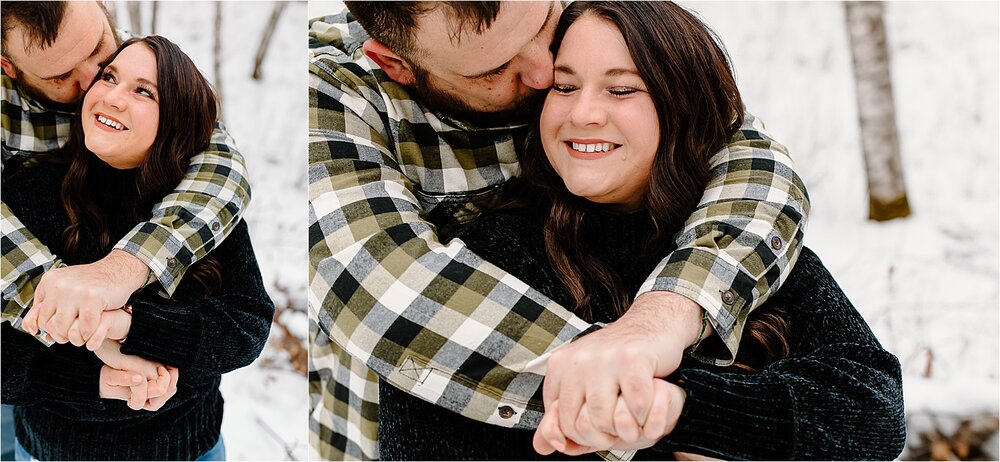 couple-smiling-hugging-snow.jpg