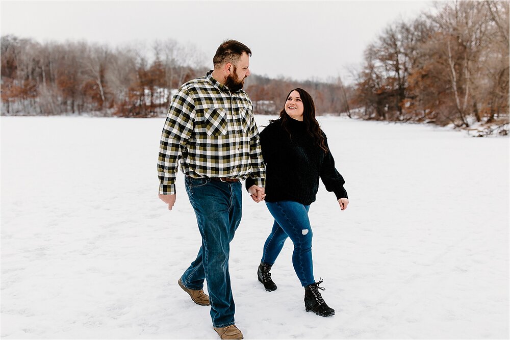 couple-walking-smiling-snow-winter.jpg