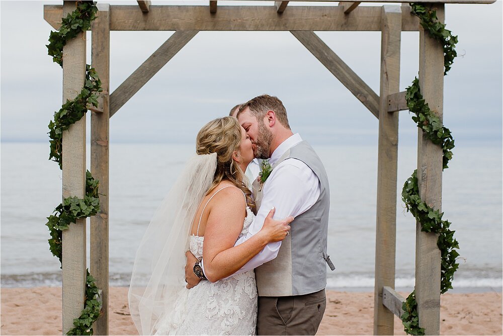 bride-groom-first-kiss-beach.jpg