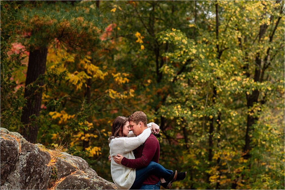 couple-kissing-trees-rocks.jpg