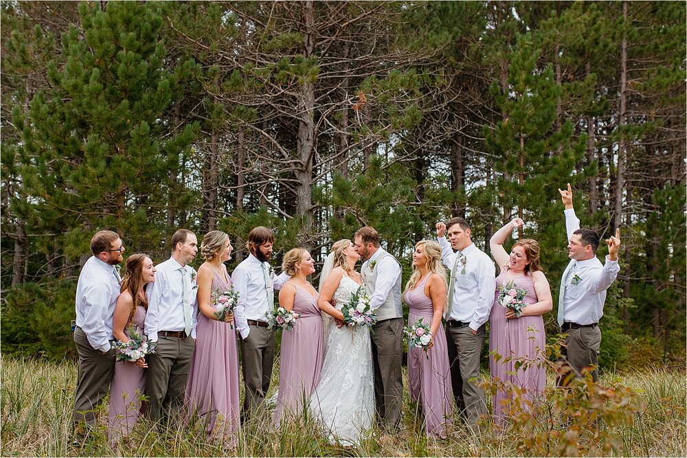wedding-party-woods-cheering.jpg