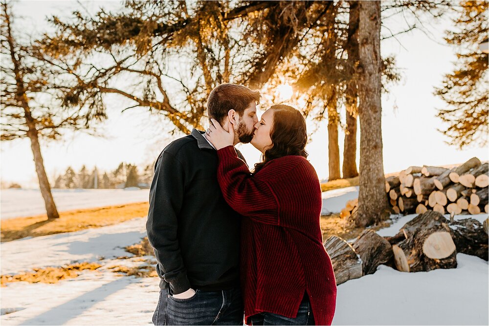 couple-kissing-woods-golden-hour.jpg