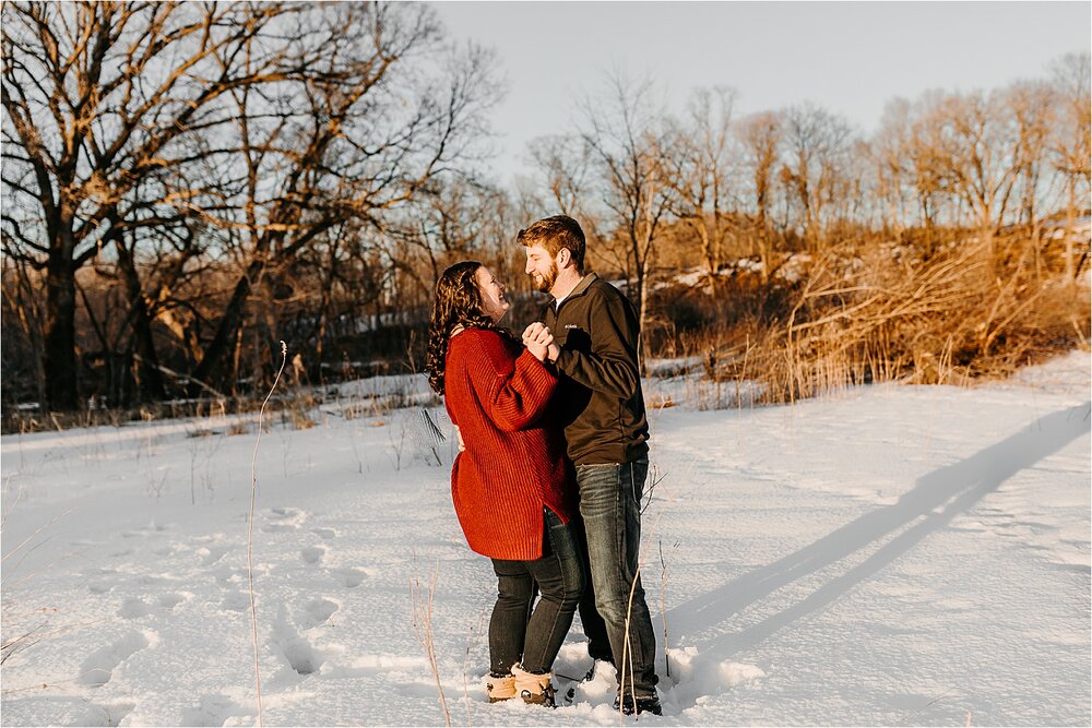 couple-dancing-snow-engaged.jpg