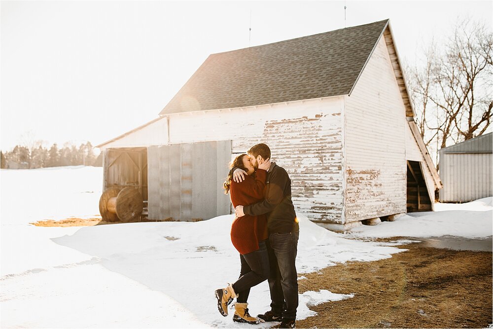 couple-barn-sun-kissing-snow.jpg