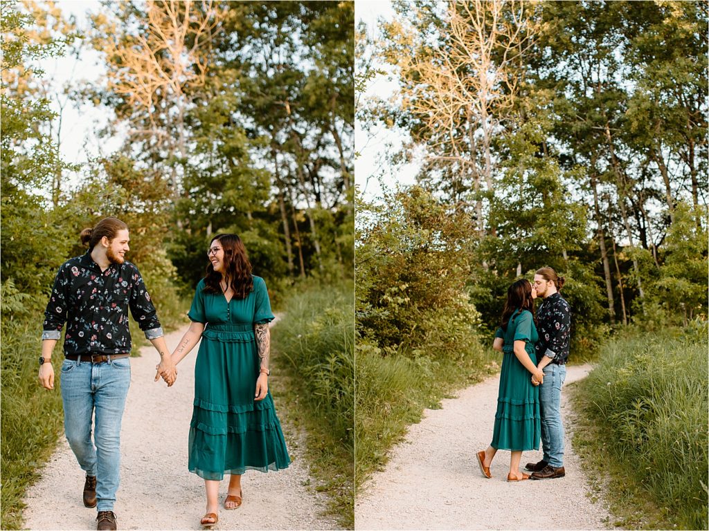 couple kissing and walking on gravel road